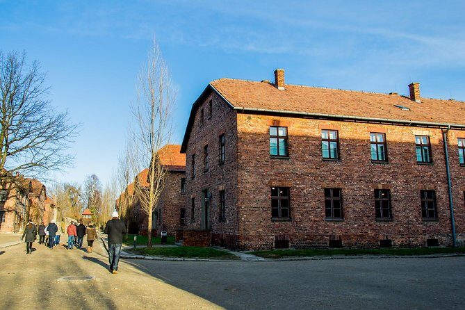 Auschwitz Birkenau Guided Tour with Ticket Hotel Pickup Small Van - Breaks, bathrooms, and the lunch reality