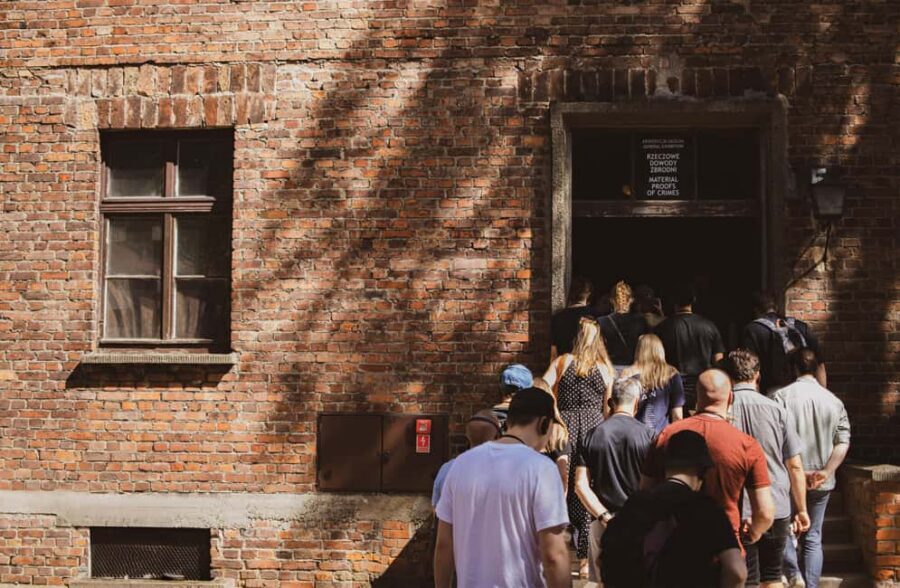 From Krakow: Auschwitz-Birkenau Guided Tour & Pickup - Auschwitz I: The Arbeit Macht Frei Gate and the Meaning of the First Camp