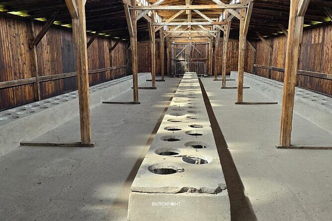 from Kraków: Auschwitz excursion with guaranteed Dutch guide - Stop 2: Birkenau—Judenrampe selection, barracks, and the Dutch monument