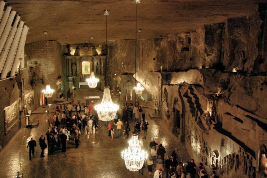From Krakow: Auschwitz Museum and Wieliczka Salt Mine Tour - Wieliczka Salt Mine: 380 steps and 64 meters down