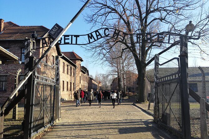 Full-Day Tour From Warsaw to Auschwitz (guided) and Krakow by car - Auschwitz-Birkenau with an English guide: what you’re actually paying for