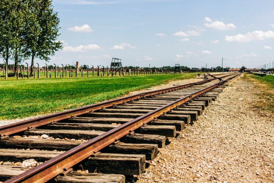 Krakow: Auschwitz-Birkenau Live Guided Tour & Hotel Pickup - Hotel Pickup and the Road to the Camps